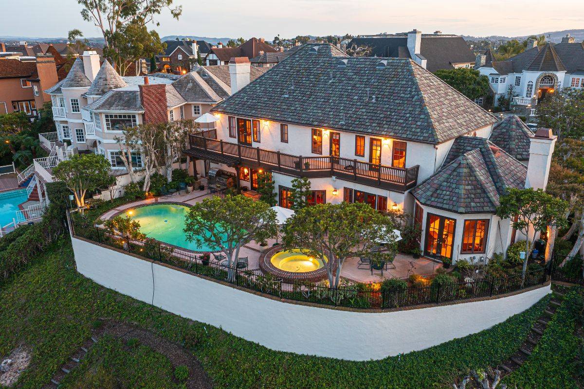 Resort-style backyard with pool and outdoor living space at a luxurious Nellie Gail Ranch property sold by the Brad Feldman Group, top listing agents in Laguna Hills. The team helps clients protect their valuable assets with comprehensive insurance solutions tailored to Orange County's unique market.