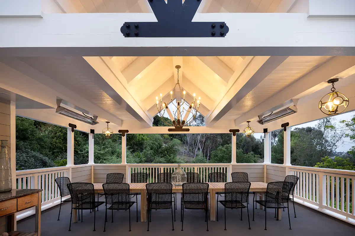 Outdoor living area with big dining table at a Laguna Hills home for sale by top real estate agents Brad Feldman Group
