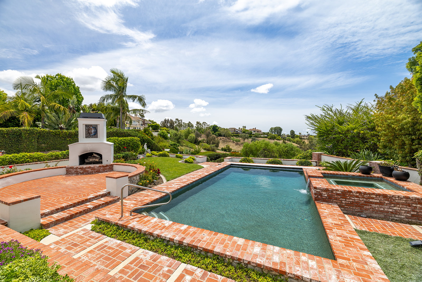 View above the backyard pool in a Nellie Gail Ranch, Laguna Hills real estate listing by the best agents at Brad Feldman Group