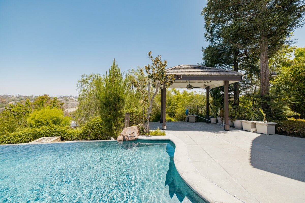 Pool and gazebo at a luxury home in Nellie Gail Ranch which requires home inspection services for Orange County homebuyers