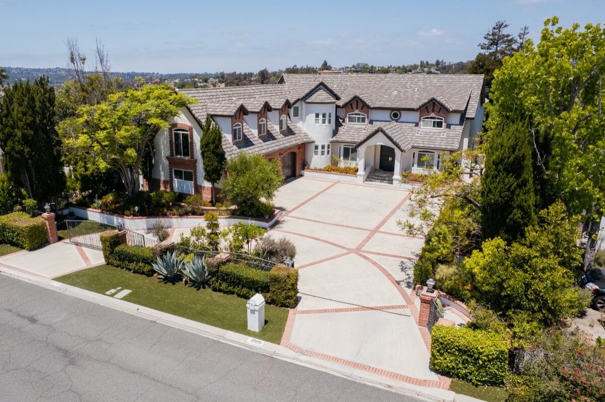 Front aerial view of a luxury home sold in Nellie Gail Ranch, a community where we commonly help sellers as a top listing agent in Laguna Hills