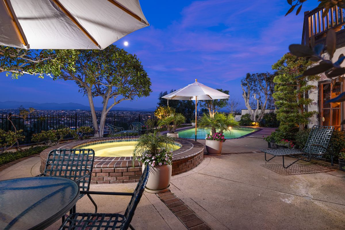 Backyard pool and spa at dusk, with views above Orange County real estate, listed by the best local realtor agents at the Feldman Mason Group, formerly the Brad Feldman Group