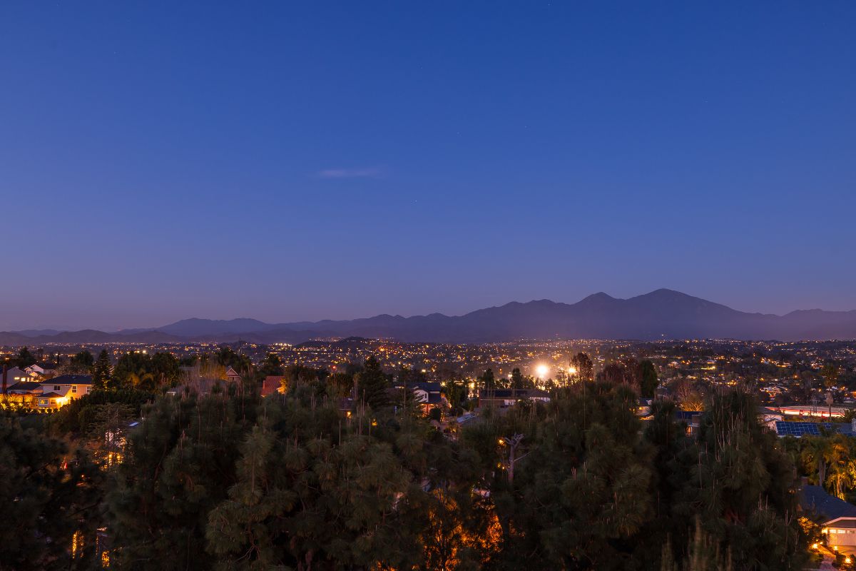 Views of Laguna Hills at dusk over Orange County, CA, with this listing photo from the top real estate agents in Nellie Gail Ranch and surrounding communities, the Feldman Mason Group
